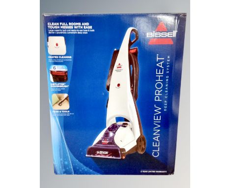 A Bissell Dirtlifter carpet cleaner together with a Bissell stain eraser model 20061 and three bottles of Bissell cleaning so