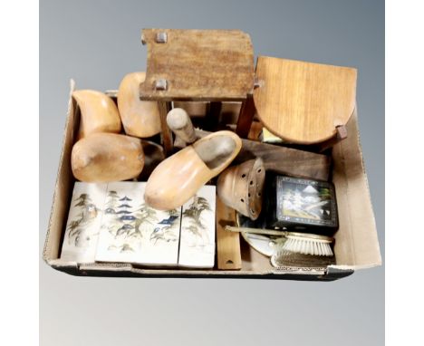 A box containing vintage wooden pieces including clogs, book troughs, oversized rattle, 20th century Japanese jewellery boxes