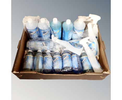 A box containing a quantity of Blue Magic multi-surface cleaner and stain remover, together with refillable bottles.