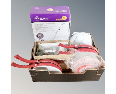 A box containing a Light N Easy floor steam cleaner, boxed, together with kitchenalia including a set of four Tower frying pa