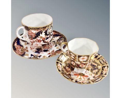 A 20th century Royal Crown Derby Imari teacup and saucer together with a further 19th century teacup and saucer.