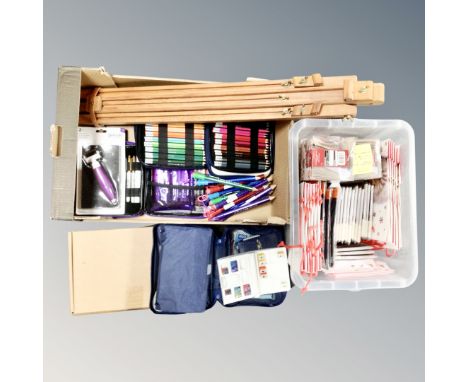 A box containing artist's supplies, easel, cased coloured pencils, together with a further crate containing Christmas gift ba
