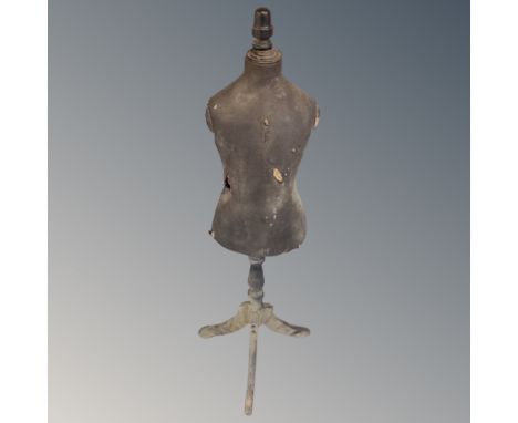 A vintage child's mannequin on stand 
