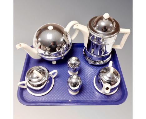 A four piece mid-20th century Heatmaster tea service together with two matching egg cups. (6)