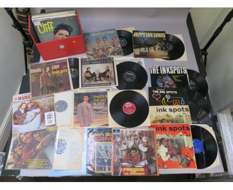 Red record box of pop and rock n roll LP vinyl records including The Monkees RD 7844, The Mamas and the Papas, Ink Spots on G