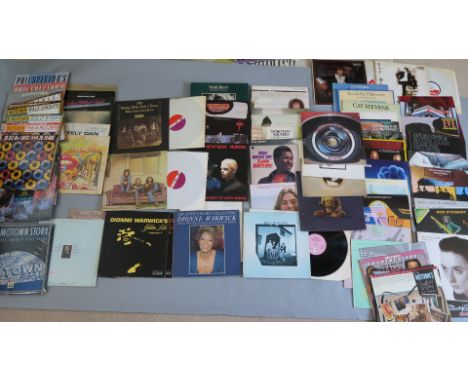 Collection of vinyl LP records includes many promotional records, from artists including Cat Stevens, Traffic, Crosby, Stills