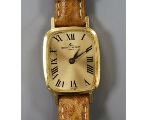 A lady's 18ct gold Baume & Mercier manual back wind wrist watch.