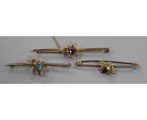 An Edwardian 9ct gold, opal and gem set spider bar brooch, one other similar yellow metal and gem set bar brooch and one othe