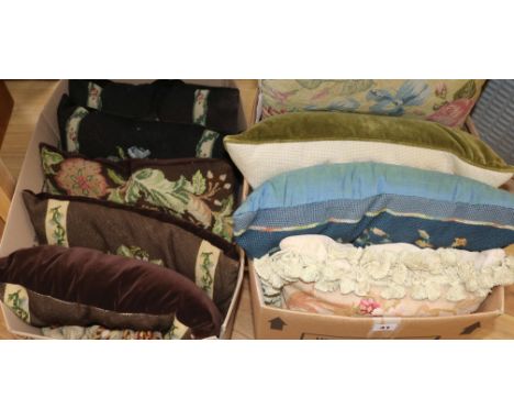 A collection of nine floral tapestry cushions