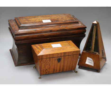 Two Victorian tea caddies, one rosewood and one satinwood, together with a Victorian metronome longest 35.5cm
