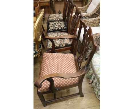 Four 19th century Chippendale style mahogany dining chairs, with drop in tapestry upholstered seats (one arm, three singles)