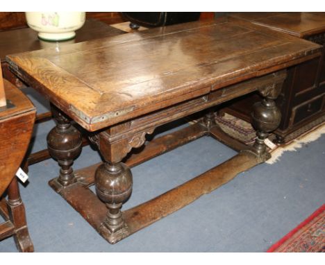 A mid 17th century Flemish oak draw leaf table W.149cm