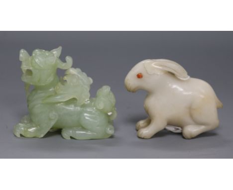 A Chinese white stone figure of a rabbit and a bowenite jade lion-dog tallest 7cm