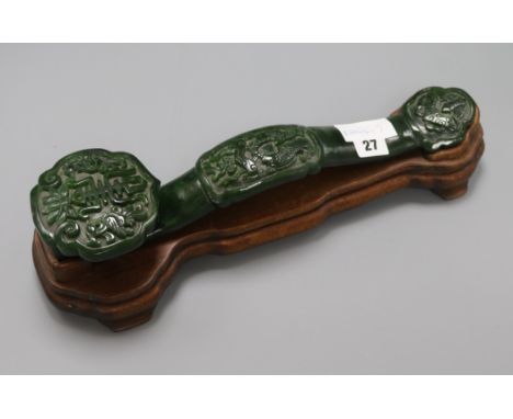 A Chinese spinach green jade ruyi sceptre length 40cm
