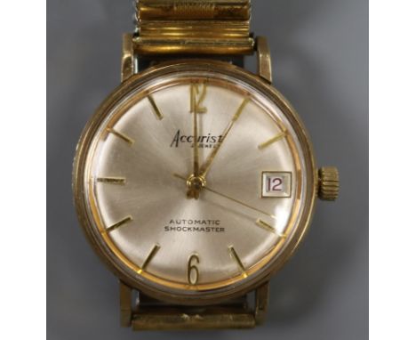 A vintage gentlemen's 9ct gold-cased Accurist Shockmaster Automatic wristwatch, 21-jewel, with silvered dial, date aperture, 