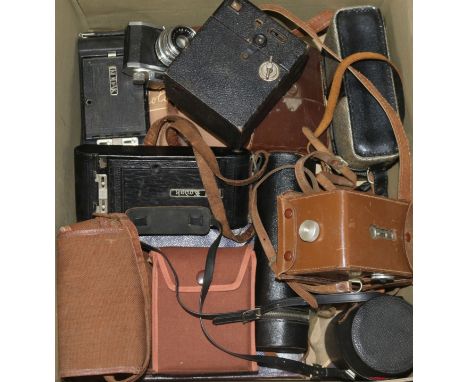 A quantity of cameras and camera equipment