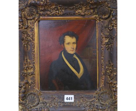 19th century English School, oil on panel, portrait of a gentleman in a library, 24 x 19cm