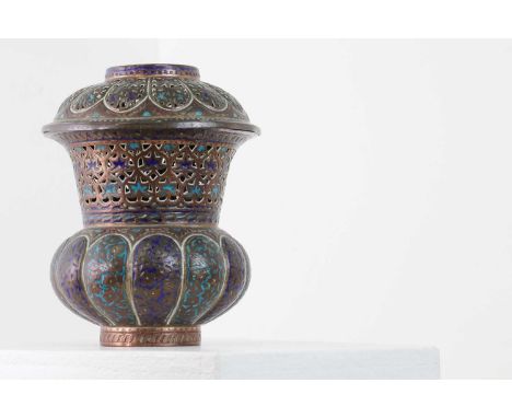 A gilt-copper and soft-enamel censer and cover,c.1890, Indian, Kashmir, of urn form, pierced with soft enamel in blue, turquo