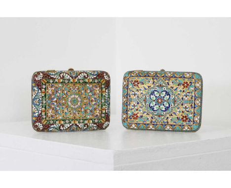 Two silver-gilt and cloisonné cigarette cases,in the Russian style, each of rectangular form with rounded corners, the hinged