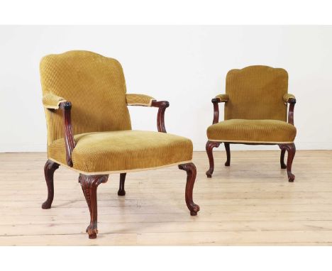 A pair of George II-style mahogany Gainsborough armchairs,c.1900, each with open arms and raised on knee-carved front support