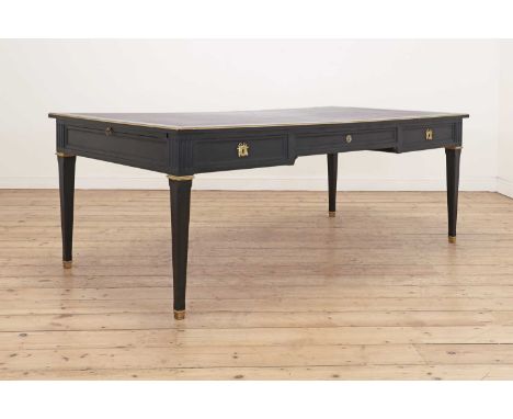 A Louis XVI-style ebonised oak and brass-mounted bureau plat,of recent manufacture, French, the rectangular top with an inset