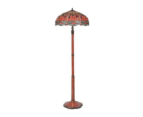 A MODERN PATINATED METAL AND COMPOSITION STANDARD LAMP IN THE TIFFANY STYLEThe 'jewelled' and coloured composition domed shad