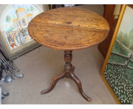 A early 19th Century provincial tilt top tripod table. 