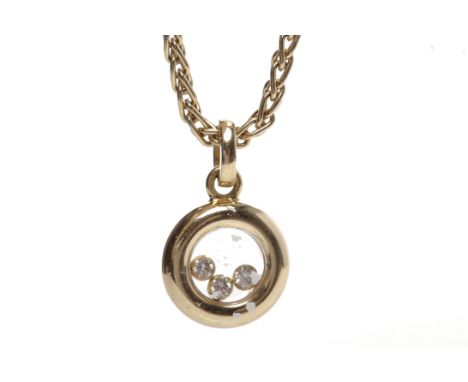 CHOPARD HAPPY DIAMONDS PENDANTof circular form, set with three free moving diamonds, marked  CHOPARD 750 LUC, 9660365, on a c