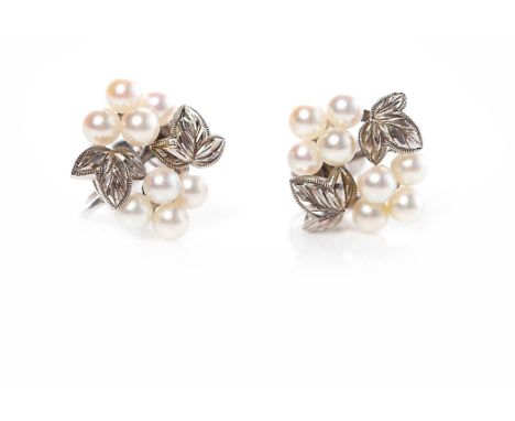 PAIR OF MIKIMOTO PEARL EARRINGSeach formed by spherical white pearls and engraved sections of silver to form the grape and le