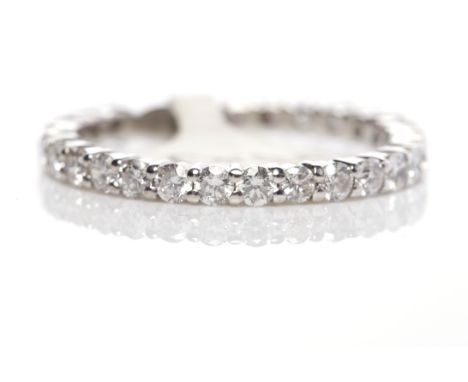 DIAMOND ETERNITY RINGset with round diamonds totalling approximately 0.60 carats, in eighteen carat white gold, size M