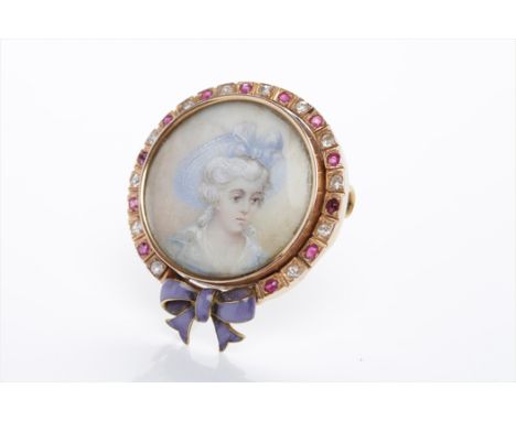 LATE VICTORIAN ENAMELLED DIAMOND AND RUBY SET PORTRAIT BROOCHof circular form, set with a central image of a woman, the surro