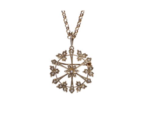 VICTORIAN PEARL SET BROOCH/PENDANTof circular floral form, set with split pearls, unmarked, on an unmarked chain