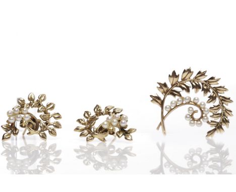 1960s PEARL BROOCH AND EARRINGS SETthe brooch in the form of a floral spray and set with seed pearls, the earrings of matchin