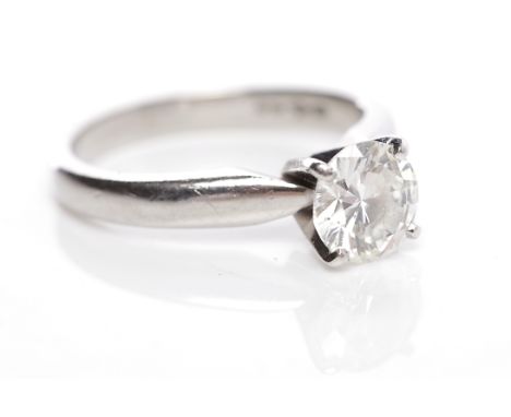 IMPRESSIVE DIAMOND SOLITAIRE RINGthe brilliant cut diamond measuring 1.01 carats, in platinum, size K