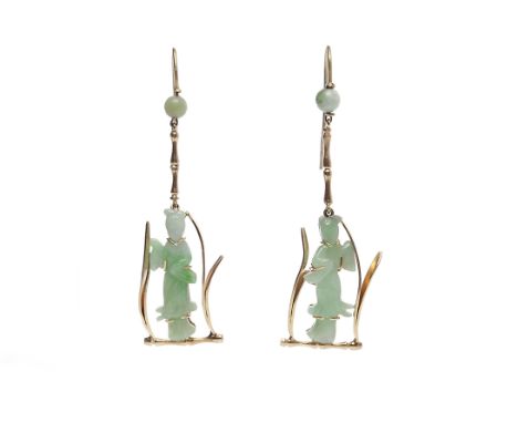 PAIR OF JADE SET DROP EARRINGSeach formed by a carved section of jade depicting Guan Ying within a framework, 57mm long to ho
