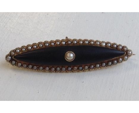 VICTORIAN JET AND PEARL MOURNING BROOCHset in fifteen carat gold 