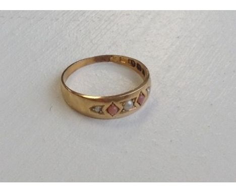 PEARL AND CORAL DRESS RINGset in eighteen carat gold 