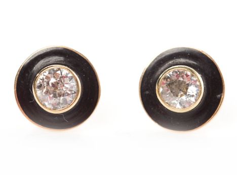 PAIR OF ART DECO DIAMOND AND ENAMEL STUD EARRINGSeach set with a single old brilliant cut diamond of approximately 0.87 carat