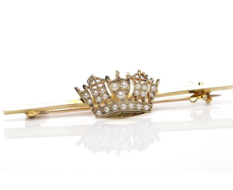 NINE CARAT GOLD PEARL SET SWEETHEART BROOCHof pierced form, marked for nine carat gold, 52mm long