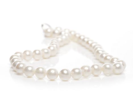 PEARL NECKLACEformed by spherical pearls, with a silver diamond set clasp