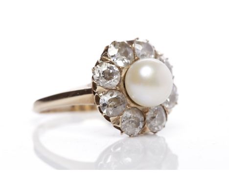 EARLY TWENTIETH CENTURY PEARL AND DIAMOND CLUSTER RINGthe central pearl 7.1mm across, surrounded by diamonds totalling approx