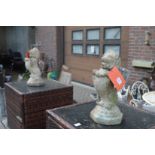 A pair of reconstituted stone gate post finials modelled as lions rampant.
