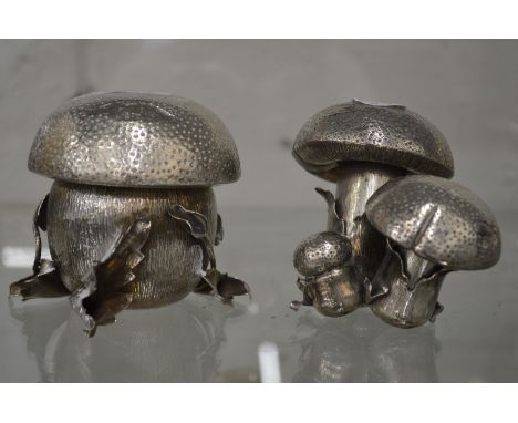 An unusual silver salt and pepper modelled as toadstools together with the matching preserve jar.