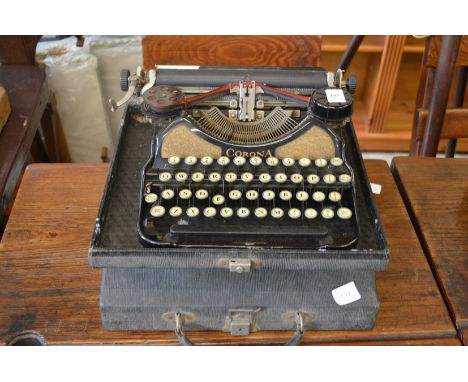A cased Corona typewriter.