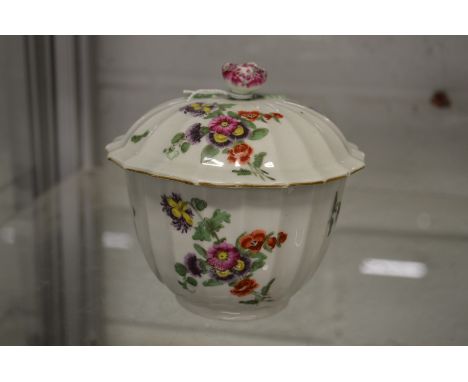 A good first period Worcester porcelain circular bowl and cover painted with flowers.