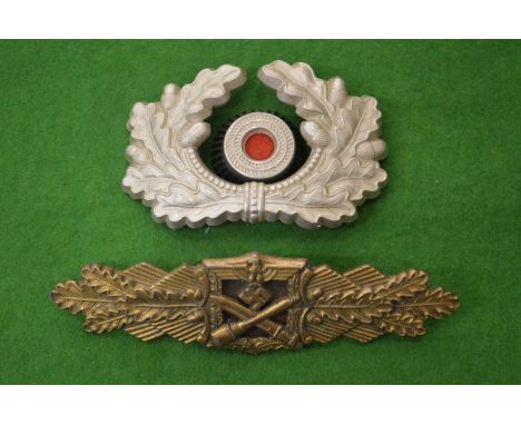 A German military badge and another item.