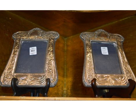 A pair of Art Nouveau silver photograph frames.
