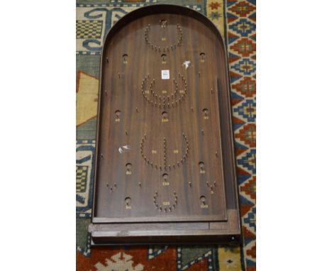 A bagatelle board.