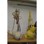 Two angle poise lamps.