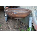 A wrought iron fire pit.